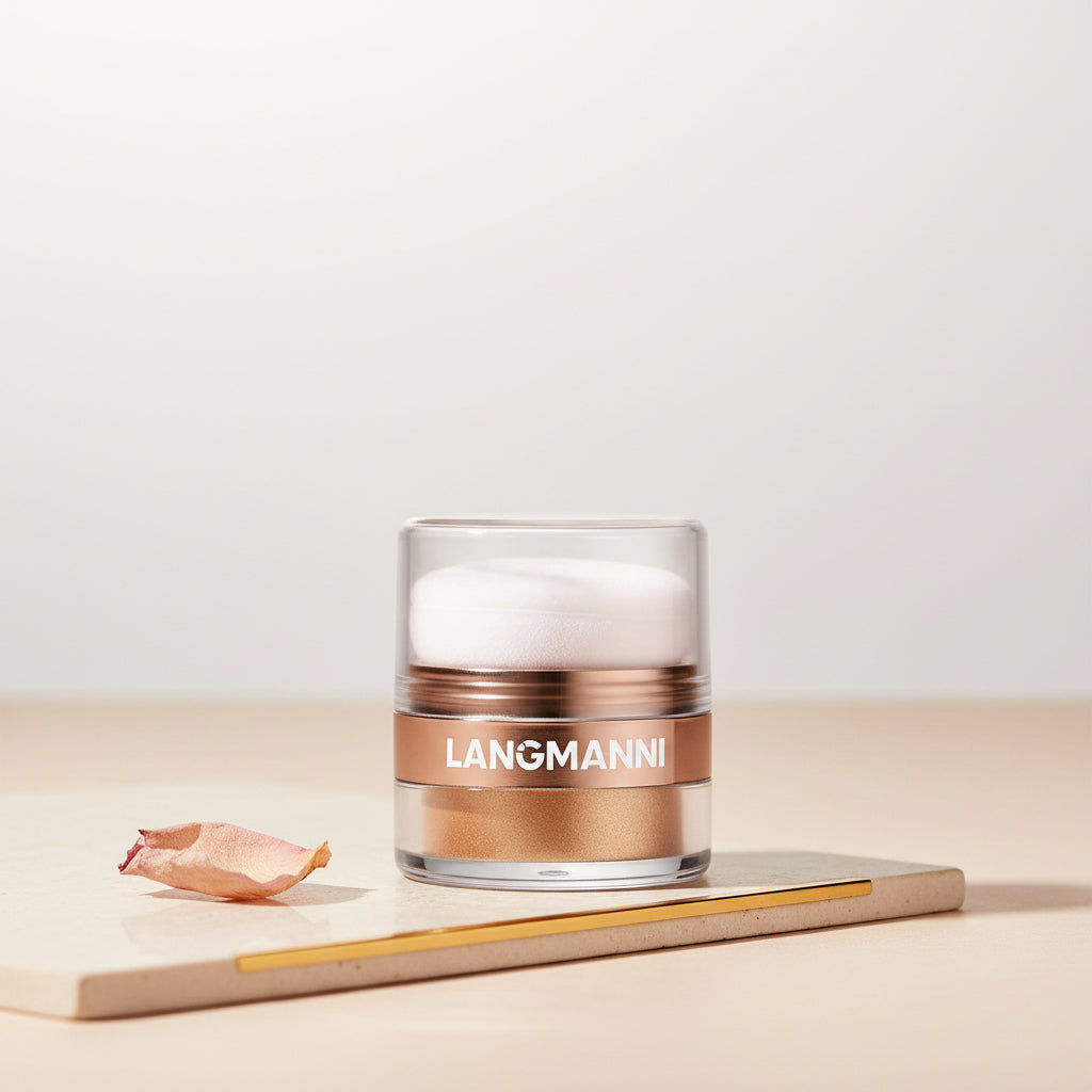 Finely milled glow highlighter powder for face and body with warm white and golden shimmer tones.
